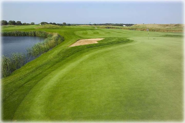 View of a sand trap next to a hole on the course at Shepherd's Crook