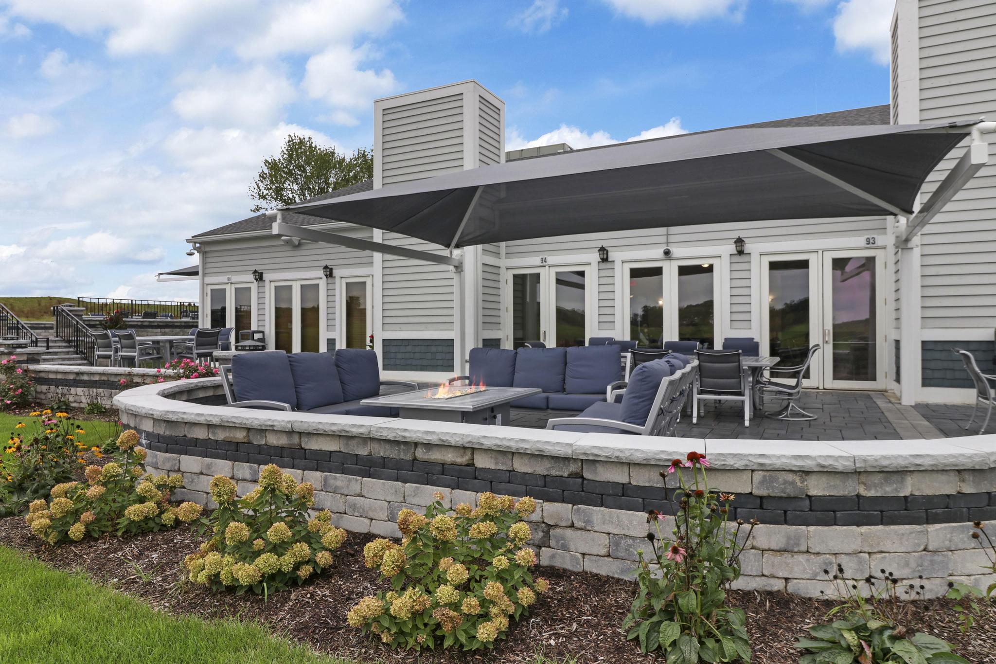 view of clubhouse with patio deck